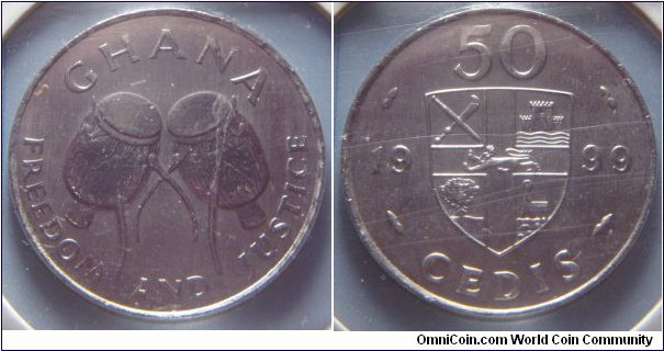 Ghana | 
50 Cedis, 1999 | 
27.5 mm, 7.5 gr. | 
Nickel plated Steel | 

Obverse: Ewe Drums | 
Lettering: GHANA FREEDOM AND JUSTICE | 

Reverse: Shield divide date and denomination | 
Lettering: 50 CEDIS 1999 |