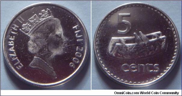 Fiji | 
5 Cents, 2006 | 
19.35 mm, 2.8 gr. | 
Copper-nickel | 

Obverse: Queen Elizabeth facing right, date right | 
Lettering: ELIZABETH II FIJI 2006 | 

Reverse: Fijian drum (lali), denomination | 
Lettering: 5 cents |