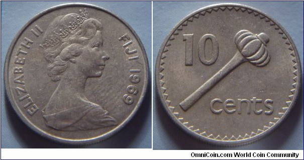 Fiji | 
10 Cents, 1969 | 
23.6 mm, 5.6 gr. | 
Copper-nickel | 

Obverse: Queen Elizabeth facing right, date right | 
Lettering: ELIZABETH II FIJI 1969 | 

Reverse: Fijian Ula Tava Tava Throwing Club, denomination | 
Lettering: 10 cents |