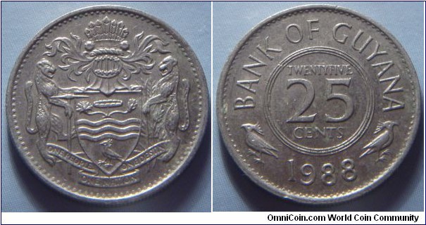 Guyana | 
25 Cents, 1988 | 
21.85 mm, 4.25 gr. | 
Copper-nickel | 

Obverse: National Coat of Arms | 

Reverse: Denomination, date below | 
Lettering: BANK OF GUYANA TWENTYFIVE 25 CENTS 1988 |