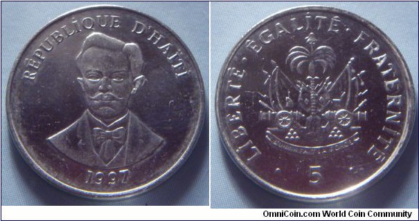 Haiti | 
5 Centimes, 1997 | 
19.9 mm, 3.1 gr. | 
Nickel plated Steel | 

Obverse: Charlemagne Masséna Péralte, date below | 
Lettering: RÉPUBLİQUE D’HAÏTİ 1997 | 

Reverse: National Coat of Arms, denomination below | 
Lettering: • LİBERTÉ•ÉGALİTÉ•FRATERNİTÉ • 5 |