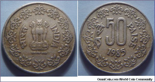 India | 
50 Paise, 1985 | 
24 mm, 5 gr. | 
Copper-nickel | 

Obverse: Ashoka Lion Capitol | 
Lettering: भारत INDIA सत्यमेव जयते | 

Reverse: Denomination, date below | 
Lettering: पैसे 50 PAISE 1985 |