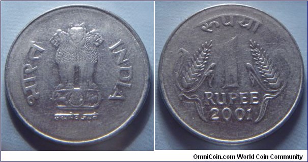 India | 
1 Rupee, 2001 | 
25 mm, 4.85 gr. | 
Stainless Steel | 

Obverse: Ashoka Lion Capitol | 
Lettering: भारत INDIA सत्यमेव जयते | 

Reverse: Denomination, date below | 
Lettering: रुपया 1 RUPEE 2001 |