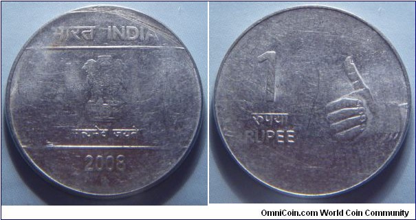India | 
1 Rupee, 2008 | 
25 mm, 4.8 gr. | 
Stainless Steel | 

Obverse: Ashoka Lion Capitol, date below | 
Lettering: भारत INDIA सत्यमेव जयते 2008 | 

Reverse: A right hand making thumbs up, denomination left | 
Lettering: 1 रुपया RUPEE |