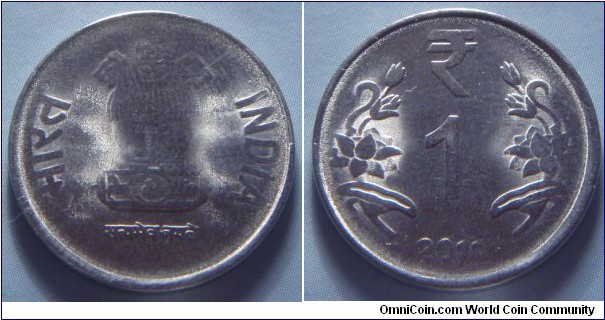 India | 
1 Rupee, 2011 | 
22 mm, 3.8 gr. | 
Stainless Steel | 

Obverse: Ashoka Lion Capitol | 
Lettering: भारत INDIA रूपये सत्यमेव जयते | 

Reverse: Denomination, date below| 
Lettering: ₹ 1 2011 |