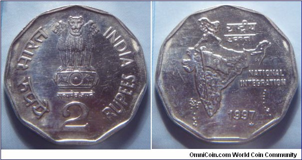 India | 
2 Rupees, 1997 – National Integration | 
26 mm, 5.97 gr. | 
Copper-nickel | 

Obverse: Ashoka Lion Capitol, denomination below | 
Lettering: भारत INDIA रूपये 2 RUPEES सत्यमेव जयते | 

Reverse: Map of India with National flag, date below| 
Lettering: राष्ट्रीय एकता NATIONAL INTEGRATION 1997 |