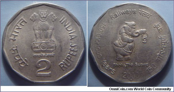 India | 
2 Rupees, 2003 – 150 Years of Railways | 
26.5 mm, 6.05 gr. | 
Copper-nickel | 

Obverse: Ashoka Lion Capitol, denomination below | 
Lettering: भारत INDIA रूपये 2 RUPEES सत्यमेव जयते | 

Reverse: Bholu The Guard facing right, date below| 
Lettering: Railways रेलवे 150 Glorious Years 150 गौरवपूर्ण वर्ष Bholu, The Guard 2003 |