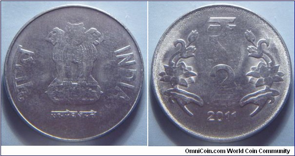 India | 
2 Rupees, 2011 | 
25 mm, 4.9 gr. | 
Stainless Steel | 

Obverse: Ashoka Lion Capitol | 
Lettering: भारत INDIA रूपये सत्यमेव जयते | 

Reverse: Denomination, date below| 
Lettering: ₹ 2 2011 |
