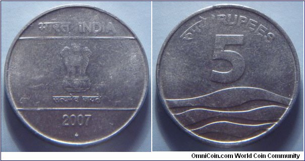 India | 
5 Rupees, 2007 | 
23 mm, 6 gr. | 
Stainless Steel | 

Obverse: Ashoka Lion Capitol, date below | 
Lettering: भारत INDIA सत्यमेव जयते 2007 | 

Reverse: Waves, denomination above | 
Lettering: रूपये RUPEES 5 |