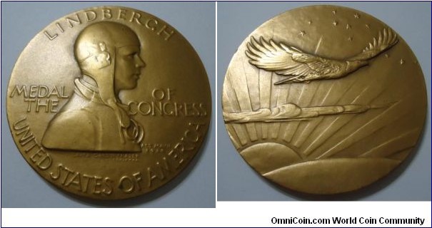 1928 USA Tribute From Congress to Charles Lindbergh Medal by Laura Gardin Fruser strunk by U.S. Mint. Gilted Bronze: 70MM.
Obv: Bust of Lindbergh in avail helmet to right. Legend LINDBERGH MEDAL OF THE CONGRESS UNITED STATES OF AMERICA. ACT MAY 4, 1928. Signed LAVRA CARDIN FRASER,SCVLPTOR.  Obv: Eagle represented 
