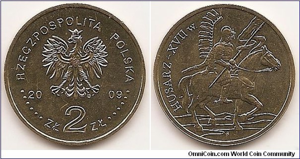 2 Zlote
Y#670
8.1500 g., Brass, 27 mm. Subject: History of the Polish Cavalry Obv: : An image of the Eagle established as the State Emblem of the Republic of Poland; on the sides of the Eagle the notation of the year of issue, 20-09; below the Eagle an inscription, ZŁ 2 ZŁ, in the rim an inscription, RZECZPOSPOLITA POLSKA, preceded and followed by six pearls. The Mint’s mark: M/W, under the Eagle’s left leg Rev: A stylized image of the hussar of the 17th century, on horseback, in armour, with the hussar’s wing and leopard skin on the back, carrying a lance with a pennant. On the left-hand side, a semicircular inscription, HUSARZ – XVIIw. Edge: The inscription, NBP, repeated eight times, every second one inverted by 180 degrees, separated by stars. Reverse designer: Andrzej Nowakowski Obverse designer: Ewa Tyc-KarpińsKa