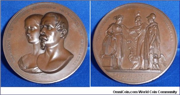 1855 UK Napoleon III & Eugenie London Reception Medal by Benjamin Wyon. Bronze: 75MM./242 gms. Mintage 350.
Obv: Bust of Napoleon III in the forground with Eugenie behind. Legend NAPOLEON III ET EUGENIA GALLORUM IMPERATOR ET IMPERATRIX. Sined B.WYON. Rev: Britannia, representing Great Britian introducing Minerva, representing France to Londinia representing City of London. Legend CONCORDES SERVAT AMICITIA (Friendship keeps them on good terms). Exerque LONDINI RECEPTI 19.APR.1855. Signed B.WYON F. (#7 Medal of City of London series.)
