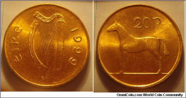 Ireland | 
20 Pingin, 1999 | 
27.1 mm, 8.47 gr. | 
Nickel-brass | 

Obverse: Irish harp (Cláirseach), date right|
Lettering: éire 1999 | 

Reverse: Irish hunting horse, denomination above | 
Lettering: 20p |