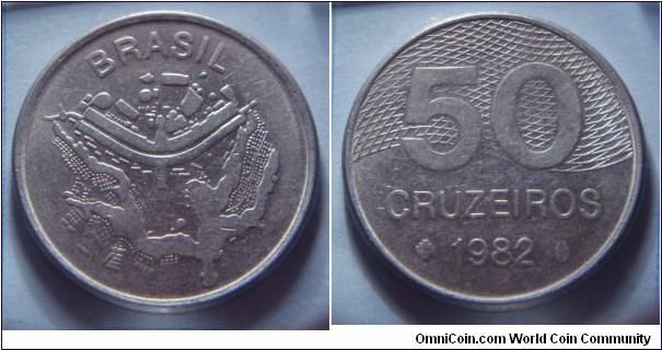 Brazil | 
50 Cruzeiros novo, 1982 | 
28 mm, 7.34 gr. | 
Stainless Steel | 

Obverse: Map of Brazil | 
Lettering: BRASIL | 

Reverse: Ribbon behind denomination, date below | 
Lettering: 50 CRUZEIROS 1982 |