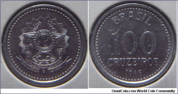 Brazil | 
100 Cruzeiros novo, 1985 | 
16.95 mm, 2.05 gr. | 
Stainless Steel | 

Obverse: State emblem | 

Reverse: Denomination, date below | 
Lettering: BRASIL 100 CRUZEIROS 1985 |