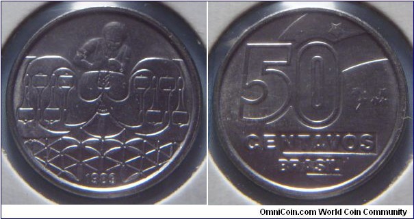 Brazil | 
50 Centavos, 1989 | 
19.5 mm, 2.83 gr. | 
Stainless Steel | 

Obverse: Female Weaver, date below |
Lettering: 1989 |  

Reverse: Denomination | 
Lettering: 50 CENTAVOS BRASIL |
