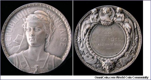 1930 France Senat Medaille d'Identite for Session of 1930. Silver: 59MM./105 gms.
Obv: Bust of the Republic, face slighly left , wearing a Phrygian cap & crowned with laurel, chest covered in armor on which there is a cockerel. Legend REPUBLIQUE FRANCAISE. Rev: Framed by architecture and painting, a medallion bearing the likenesss of Marie de Médicis. Below, between two trophies, a Gorgon's head in the center, in a beaded circle engraved SENATE 1930 M. Henri NOELL/Chef de service adjoint.
