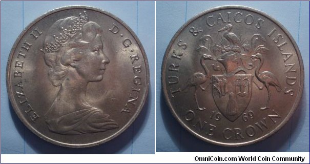 Turks and Caicos Islands | 
1 Crown, 1969 | 
38.61 mm, 28.4 gr. | 
Copper-nickel | 

Obverse: Queen Elizabeth II facing right | 
Lettering: ELIZABETH II D•G•REGINA | 

Reverse: National Coat of Arms, date below, denomination bottom | 
Lettering: TURKS & CAICOS ISLANDS 1969 ONE CROWN |