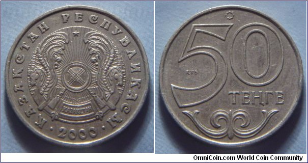 Kazakhstan | 
50 Teñge, 2000 | 
23 mm, 4.7 gr. | 
Copper-nickel-zinc | 

Obverse: National Coat of Arms, date below | 
Lettering: • ҚАЗАҚСТАН РЕСПУБЛИКАСЫ • 2000 | 

Reverse: Denomination | 
Lettering: ҚҰБ 50 ТЕҢГЕ |
