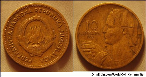 Yugoslavia | 
10 Federation Dinars, 1955 | 
21 mm, 3 gr. | 
Aluminium-bronze | 

Obverse: National Coat of Arms | 
Lettering: FEDERATIVNA NARODNA REPUBLIKA JUGOSLAVIJA | 

Reverse: Woman holding sheaf of wheat facing left, denomination left, date below | 
Lettering: 10 ДИНАРА 1955 |