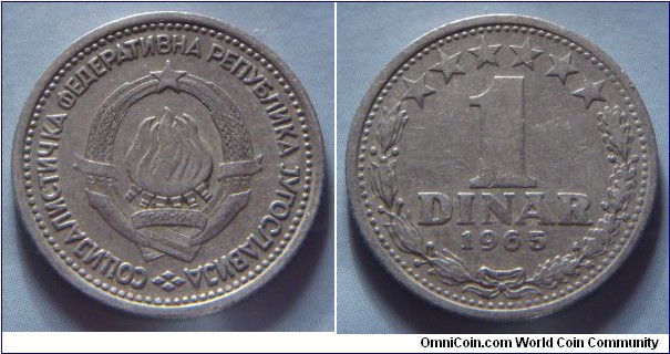 Yugoslavia | 
1 Hard Dinar, 1965 | 
21.8 mm, 3.9 gr. | 
Copper-nickel | 

Obverse: National Coat of Arms | 
Lettering: СОЦИJАЛИСТИЧКА ФЕДЕРАТИВНА РЕПУБЛИКА JУГОСЛАВИJА | 

Reverse: Denomination within wreath, date below | 
Lettering: 1 DINAR 1965 |