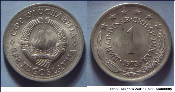 Yugoslavia | 
1 Hard Dinar, 1973 | 
21.8 mm, 4 gr. | 
Copper-nickel-zinc | 

Obverse: National Coat of Arms | 
Lettering: •СФР JУГОСЛАВИJА•SFR JUGOSLAVIJA | 

Reverse: Denomination, date below | 
Lettering: •ДИНАР•DINAR•ДИНАР•DINAR• 1 1973 |