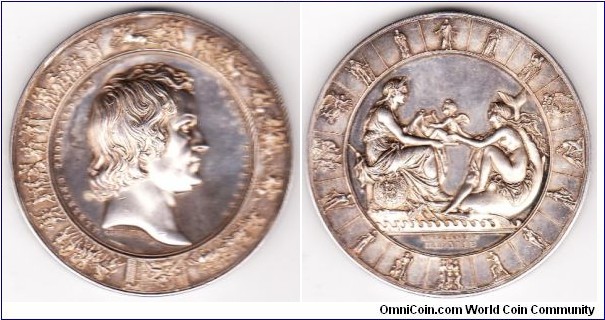 1838 Denmark Bertel Thorvalsen Medal. Silver: 61.3 MM./149.4 gms. 
Obv: Head right of leading sculptor In broad border with continuous band of minute reproductions of hos sculptures. Rev: Seated Diana in mural crown and nude muse of the sea seated on dolphin hold small putto with lyre. Border presents 16 compartments holding tiny replicas of Thorvaldsen's classical sculptures. Latin HAMBURG 1838. This medal by Christensen (1806-1844) recalls the British Royal Mint experience with Pistrucci's Waterpp Medal of similarly baffing complecty. Originally intended as a gift from the Kingdom of Denmark to be predented to Thorvaldsen upon his return from a lengthy stay abroad. It took so long to complete the dies that the medal was omly completed and strunk by 1844, just before the sculptor's death.
