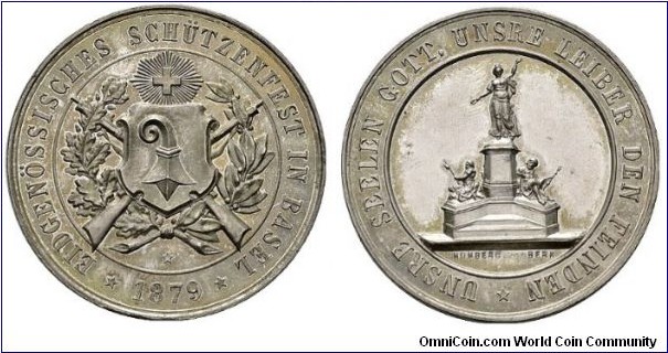 1879 Swiss Eidgenossisches Schutzenfest in Basel Shooting Medal by Franz Homberg. Silver: 37MM./27.02 gms. Mintage: 50
Obv: Coats of Arms of Basel with Cross Star above, wreaths & Reffle backing. Legend: EIDGENOSSISCHES SCHUTZENFEST IN BASEL *1879*. Rev: Statue with legend UNSERE SEELEN GOTT, UNSERE LEIBER DEN FEINDEN (Our Souls God, Our Enemies The Leiber). Signed FRANZ HOMBERG.

