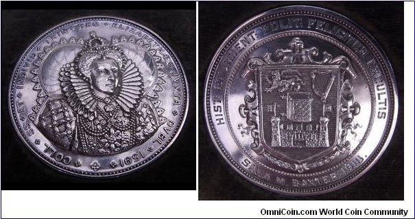 1918 UK Queen Elizabeth I of England Trinty College Dublin, Ireland Silver Award Medal. Silver: 48MM.
Obv: Crowned Elizabeth I in her Renaissance ruff and bejeweled bodice slightly right,  legend COLLEGE SS ET INDIVID TRIN REG ELIZABETHAE JVXTA DVBL 1592. Rev: Arm of Dublin, Irish harp. Legend HIST ET SCIENT POLIT FELICITER EXCULTIS SARA M BAXTER 1918. (The design related to the 1591 grant by QEI to erect a college at Dublin; the founding of Trinity.)
