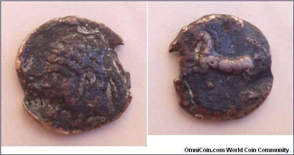 KINGS OF NUMIDIA, MASSINISSA
 Æ (28 MM, 14.20 GM., 11H) VF
Obv: Laureate and bearded head left 
Rev: Horse galloping left; pellet below