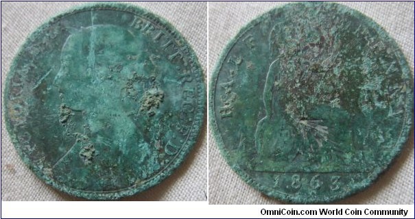 1863 tall 3 halfpenny, low grade due to ground damage, but date very clear.