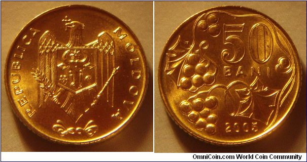 Moldova | 
50 Bani, 2005 | 
19 mm, 3.1 gr. | 
Brass clad Steel | 

Obverse: National Coat of Arms | 
Lettering: REPUBLICA MOLDOVA | 

Reverse: Denomination within grapevine, date below | 
Lettering: 50 BANI 2005 |