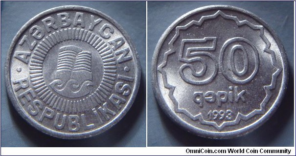 Azerbaijan | 
50 Qəpik, 1993 | 
23 mm, 4.45 gr. | 
Aluminium | 

Obverse: Maiden Tower ruins | 
Lettering: • AZƏRBAYCAN • RESPUBLİKASI | 

Reverse: Ornate circle, denomination inside, date below | 
Lettering: 50 qəpik 1993 |
