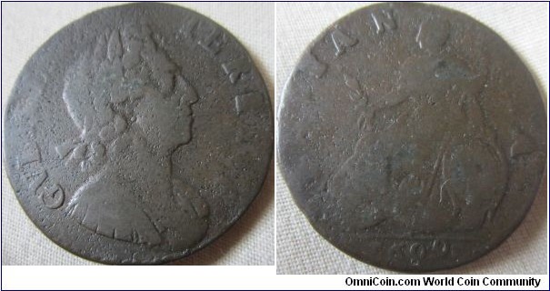 1699 halfpenny, weak strike, damaged T;s look like rectangles, last 9 touches Exergue