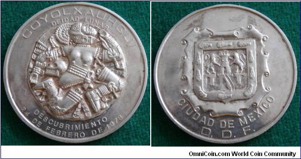 1978 Maxico Coyolxauhqui Discover Medal. Silver: 40mm./34.9 gms.
Obv:  God of Moon, legend COYOLXAUHQUI DEIDAD LUNAR DESCUBRIMIENTO/24 DE FEBRERO DE 1978. Rev: Shield of City of Mexico, legend CIUDAD DE MEXICO/D.D.F. 
