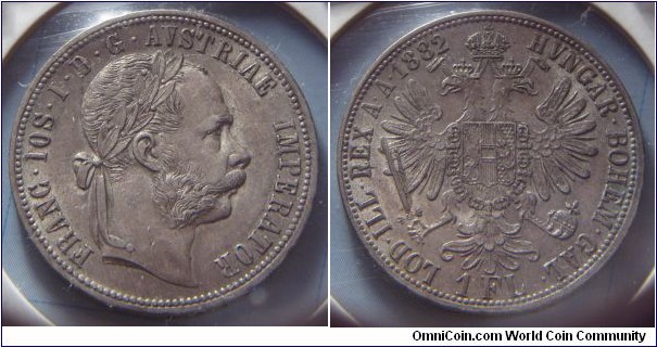 Austria-Hungary | 
1 Florin, 1882 | 
29 mm, 12.34 gr. | 
Silver (.900) | 

Obverse: Emperor Franz Ferdinand/Ferenc Ferdinánd facing right | 
Lettering: FRANC • IOS • I • D • G • AVSTRIAE IMPERATOR | 

Reverse: Double-headed eagle, symbolizing the Austro-Hungarian Empire, denomination below, date upper left | 
Lettering: HVNGAR • BOHEM • GAL • 1 FL LOD • ILL • REX A • A • 1882 |