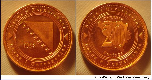 Bosnia and Herzegovina | 
20 Feninga, 1998 | 
22 mm, 4.5 gr. | 
Copper plated Steel | 

Obverse: National Coat of Arms, date left | 
Lettering: Босна и Херцговина Bosna i Hercegovina 1998 | 

Reverse: Denomination on Map of Bosnia | 
Lettering: Bosna i Hercegovina Босна и Херцговина  Фенинга 20 Feninga |