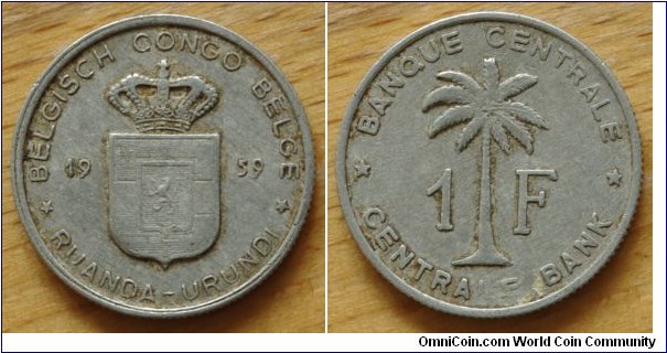 Ruanda-Urundi | 
1 Franc, 1959 | 
22.1 mm, 1.4 gr. | 
Aluminium | 

Obverse: Crowned Coat of Arms divide date | 
Lettering: * BELGISCH CONGO BELGE * 16 59 RUANDA-URUNDI  | 

Reverse: Oil Palm Tree divide denomination | 
Lettering: * BANQUE CENTRALE * 1 F CENTRALE BANK |