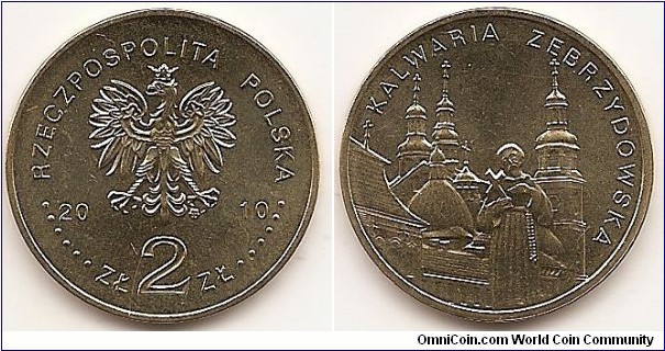 2 Zlote
Y#749
8.1500 g., Brass, 27 mm. Subject: Towns in Poland. Obv: Image of the Eagle established as the State Emblem of the Republic of Poland, at the sides of the Eagle the notation of the year of issue, 20-10, underneath the Eagle, an inscription, ZŁ 2 ZŁ, in the rim an inscription: RZECZPOSPOLITA POLSKA, preceded and followed by six pearls. The Mint’s mark under the Eagle’s left leg: M/W Rev: Centrally, a stylised image of the statue of St. Anthony against the background of the towers of the shrine dedicated to Virgin Mary and Passion of Jesus in Kalwaria Zebrzydowska. At the top, a semicircular inscription: KALWARIA ZEBRZYDOWSKA. Edge: An inscription, NBP, eight times repeated, every second one inverted by 180 degrees, separated by stars. Coin designer: Ewa Tyc-Karpińska 