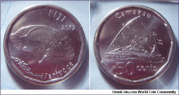 Fiji | 
50 Cents, 2012 | 
26.5 mm, 6.55 gr. | 
Nickel plated Steel |  

Obverse: Humpheaded Wrasse, date right | 
Lettering: FIJI 2012 Varivoce | 

Reverse: Sailing canoe, denomination below | 
Lettering: Camakau 50 cents |