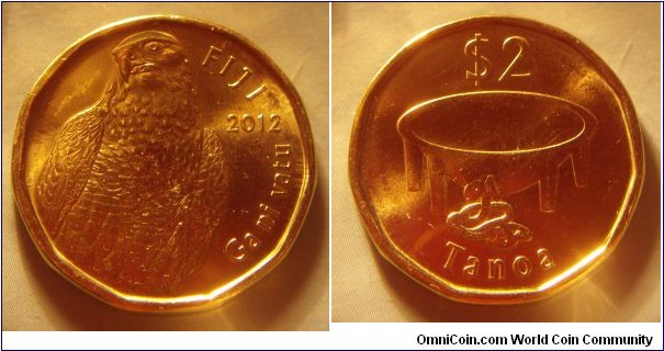 Fiji | 
2 Dollars, 2012 | 
24.39 mm, 6.1 gr. | 
Brass plated Steel |  

Obverse: Peregrine Falcon, date right | 
Lettering: FIJI 2012 Ga ni vatu | 

Reverse: A Fijian Tanoa bowl, denomination above | 
Lettering: $2 Tanoa |