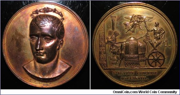 1798 France Conquest of Egypt Medal by Jouannin and Brenet.signed . Bronze: 40MM./33 gms.
Obv: Head of Napoleon three-quarter left, wreath above. Signed J.JOUANNIN F. DENON D. on truncation. Rev: Napoleon in chariot drawn by two camels. Fram above. Exergue L'EGYPTE CONQUISE MDCCXCVIII. Signed BRENET F.DENON.D.
