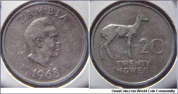 Zambia | 
20 Ngwee, 1968 | 
28.5 mm, 11.3 gr. | 
Copper-nickel | 

Obverse: First president of Zambia, Kenneth Kaunda facing right, date below | 
Lettering: ZAMBIA 1968 | 

Obverse: Bohor Reedbuck, denomination right | 
Lettering: 20 TWENTY NGWEE |