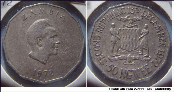 Zambia | 
50 Ngwee, 1972 | 
30 mm, 11.6 gr. | 
Copper-nickel | 

Obverse: First president of Zambia, Kenneth Kaunda facing right, date below | 
Lettering: ZAMBIA 1972 | 

Obverse: National Coat of Arms, denomination below | 
Lettering: • SECOND REPBLIC 13TH DECEMBER 1972 • 50 NGWEE |