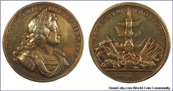 1718 UK Spanish Fleet Destroyed off Cape Passoro Medal by John Croker. Silver Gilt 45MM.
Obv: Portrait of the Hanovenrian king in periwig and armour to right. Legend GEORGIVS.D.G.MAG.BR.FR.ET.HIB.REX.F.D. Sign .I.G. Rev: Rostral column topped by the king as Neptune, with captured naval attachments and trophies piled at its base. Legend SOCIORVM PROTECTOR. Exergue:  (A fleet of 21 sails under the command of Admiral George Bying (1663-1733) destroyed much of a larger Spanish Fleet and captured Admiral Castañeta. He was one of the few commanders in navval and military history never to fail in any task he was charged with or undertook.)
