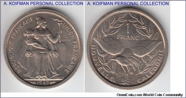 KM-E8, 1949 New Caledonia franc essai; copper-nickel, plain edge; brilliant uncirculated, but has a couple of rim spots on reverse, mintage 2,000.