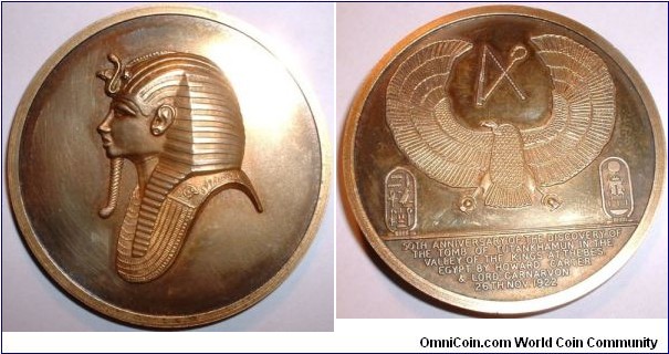 1922-1972 Egypt 50th Anniversary of the Discovery of the Tomb of Tutankhamun Medal strunk by Toye, Kenning & Spencer Ltd., 22ct Gold on Silver: 50MM./ 49 gm.,
Obv: Mask of Tutankhamun. Rev: Symbols of ancient Egypt. Exergue: 50TH ANNIVERSARY OF THE DISCOVERY OF THE TOMB OF TUTANKHAMUN IN THE VALLEY OF THE KINGS AT THEBES EGYPT. BY HOWARD CARTER & LORD CARNARVON 26TH NOV. 1922.
