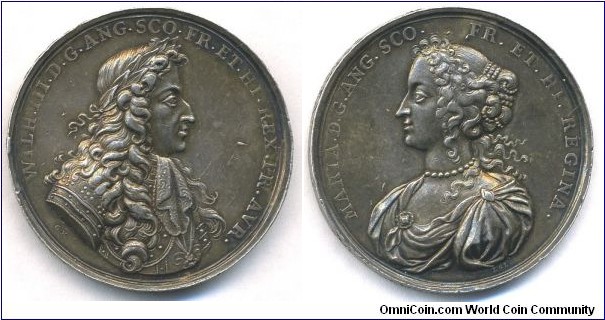 1689 UK Coronation of William and Mary Medal by G. Hautsch and Lazarus G. Lauffer, struck in Nuremberg. Silver: 41MM./29.3gms.
Obv: Laurele bust of King William III to right. Legend WILH.III.D.G.ANG.SCO.FR.ET.HI.REX.PR.AVR. Signed G.H.(Georg Hautsch)  Rev: Bust of Queen Mary to right. Legend MARIA.D.G.ANG.SCO.FR.ET.HI.REGINA. Signed L.G.L. (Lazarus G. Lauffer). Edge inscription: CORONAT.D.XI.APRIL.ANNO.MDLXXXIX.
