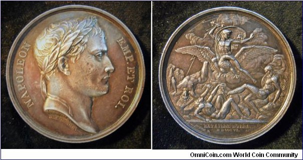 1806 France First Empire Napoleon I Battle of JENA Medal by Denon & Galle. Silver: 42MM./34.2 Gms.
Obv: Bust of Napoleon I to right. Signed in the truncated ANDRIEU F. Legend NAPOLEON-EMP.ET ROI. Rev: Napoleon on horseback explained the imperial eagle on clouds with right hurts lighting on three naked men pour on some rockc. Exergue: BATAILLE D'JENA/M D CCC VI. Signed DENON D. GALLE F.
