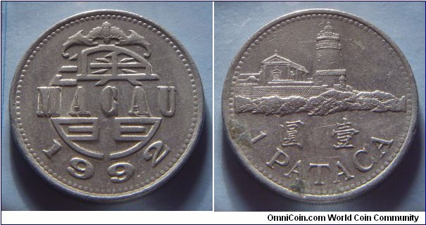 Macau | 
1 Pataca, 1992 | 
25.98 mm, 8.9 gr. | 
Copper-nickel | 

Obverse: Date | 
Lettering: MACAU 1992 | 

Reverse: Guia Lighthouse, Denomination below | 
Lettering: 圓 壹 1 PATACA |